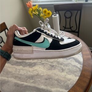 Teal and black Air Force 1s